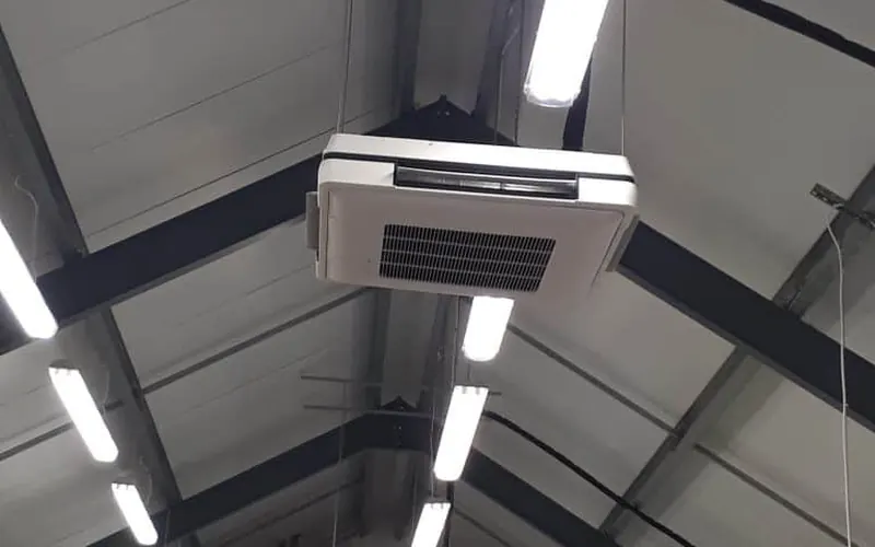 Air conditioning unit on ceiling installed by CEN Air (site caption)