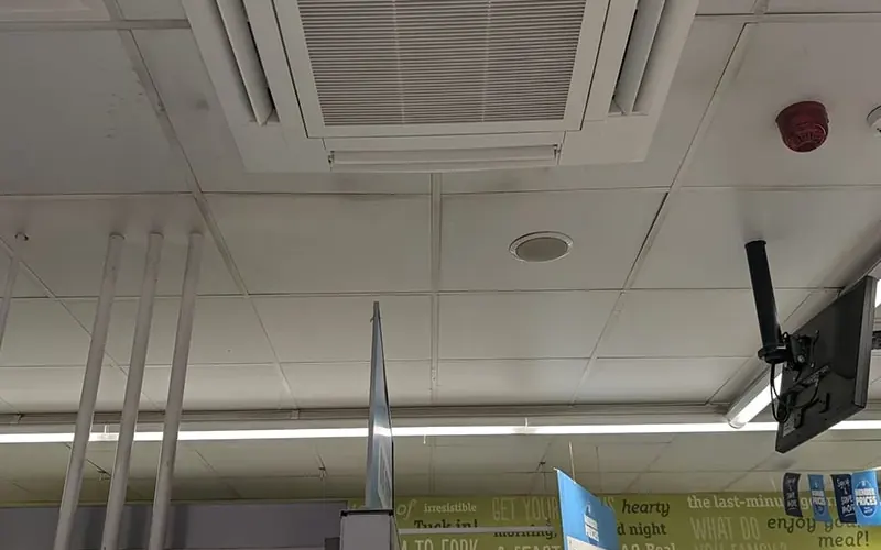 Ceiling cassette air conditioning unit in a coffee shop