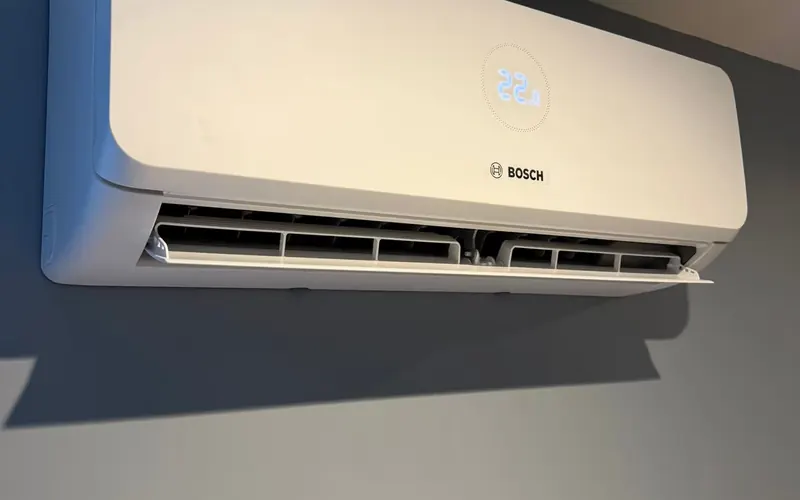 Bosch wall-mounted indoor unit on a grey wall